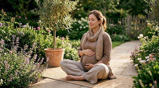 Pregnant woman practicing relaxation at home