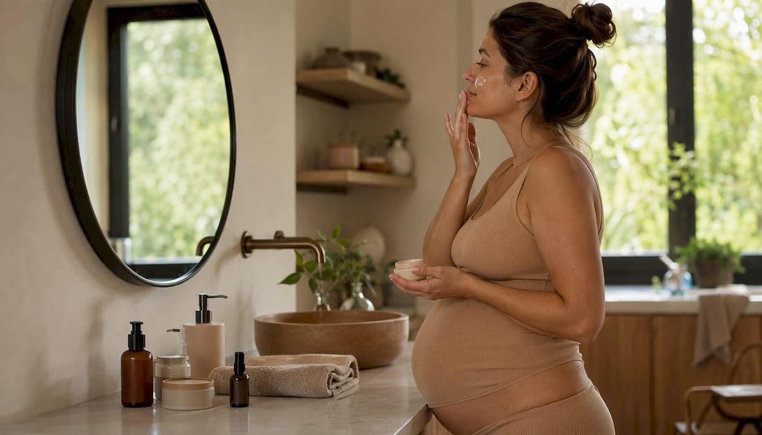 Pregnant woman applying skincare by mirror