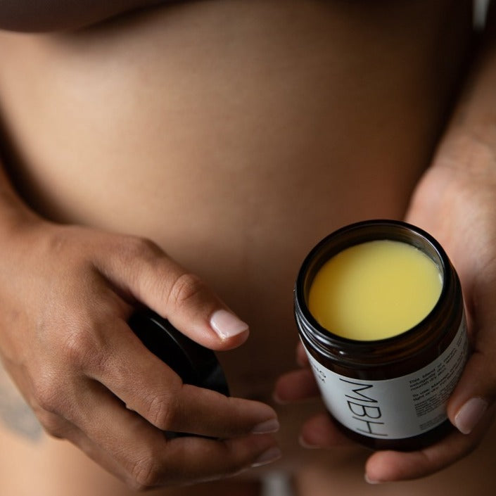 Rich pregnancy belly balm texture — kokum butter and mango butter for dry bump skin